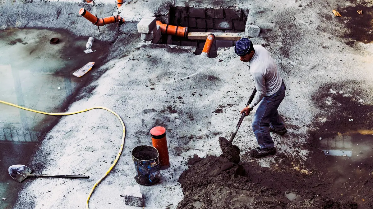 Foundation repair crew evaluating soil conditions at a Henderson, NV home